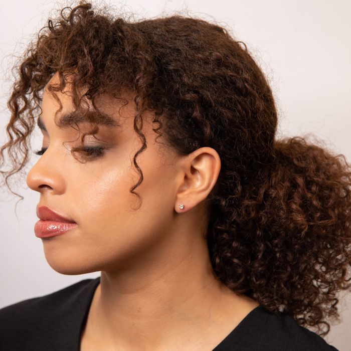 asscher cut diamond stud earrings on model