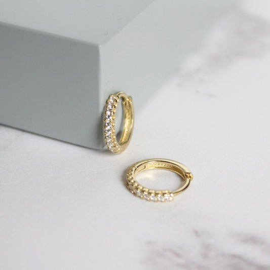 gold clicker hoop earrings with cubic zirconia | Carathea