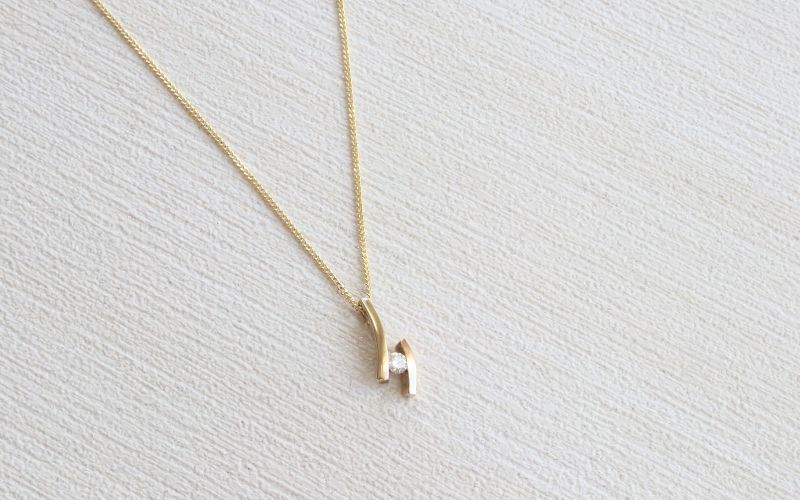 gold diamond solitaire bars pendant - Carathea jewellers