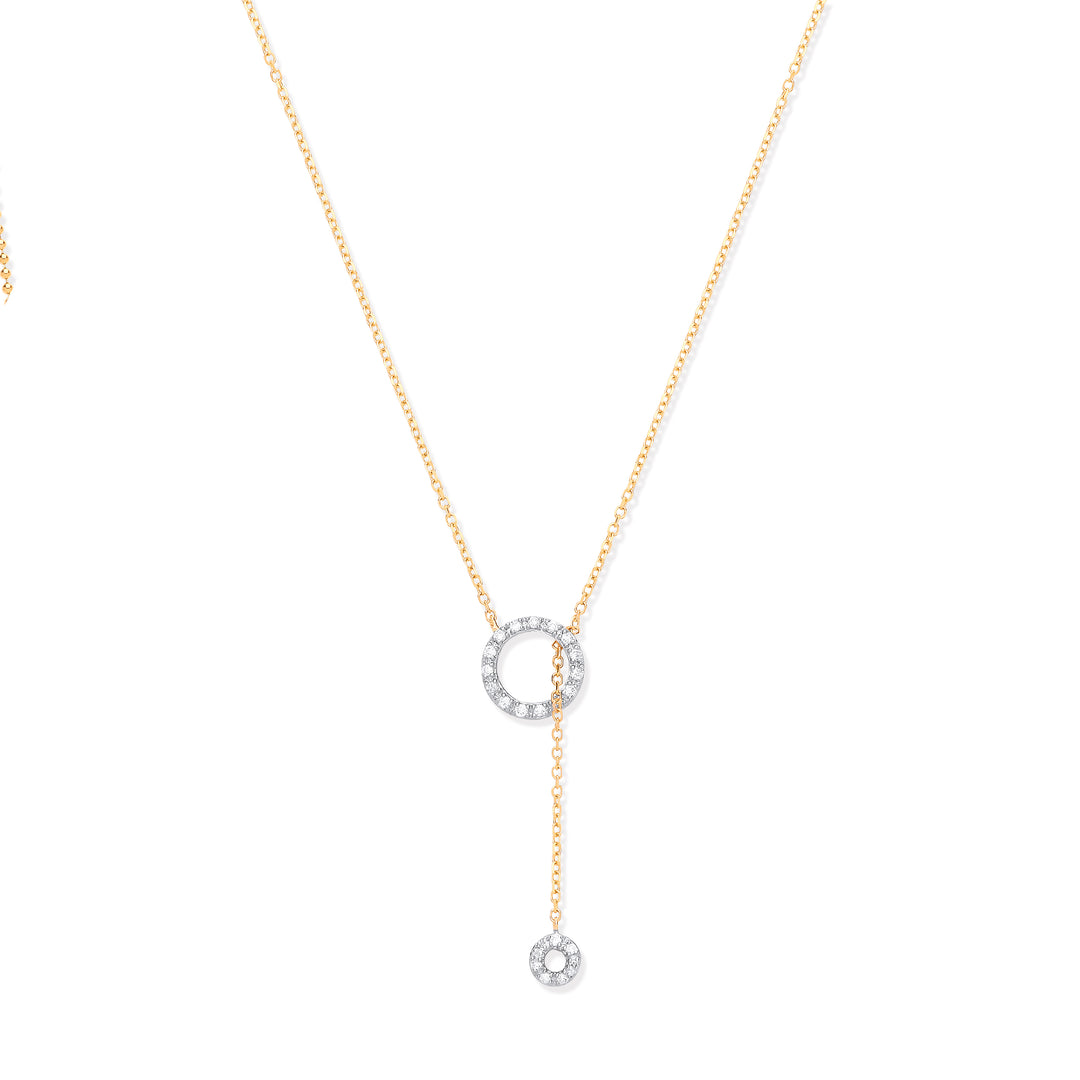 Gold lariat necklace with diamonds.