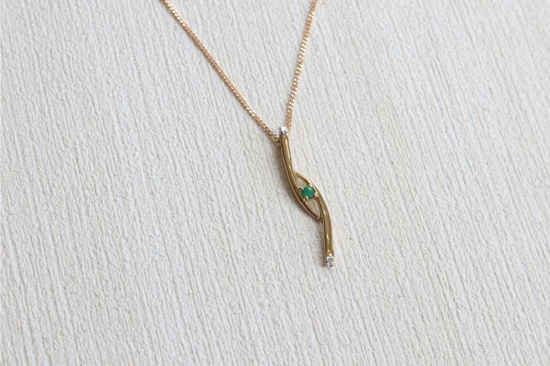 9ct gold emerald and diamond pendant - Carathea
