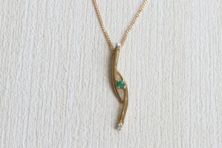 9ct gold emerald and diamond pendant - Carathea