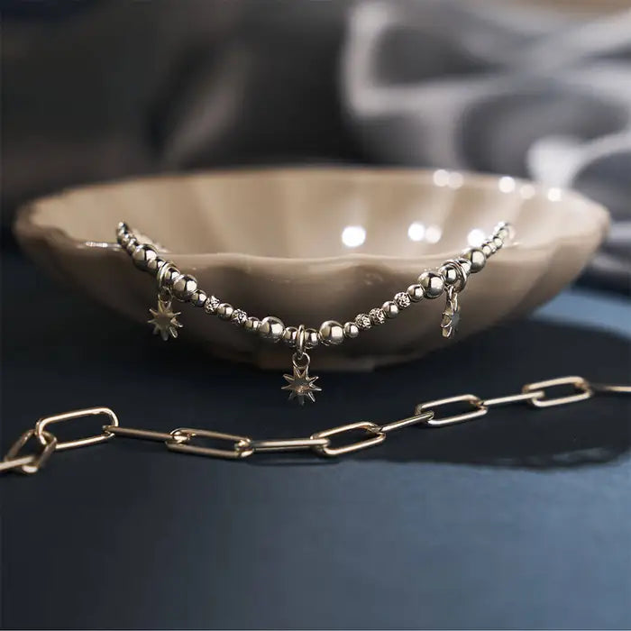 Silver beaded bracelet with sun charms -Carathea