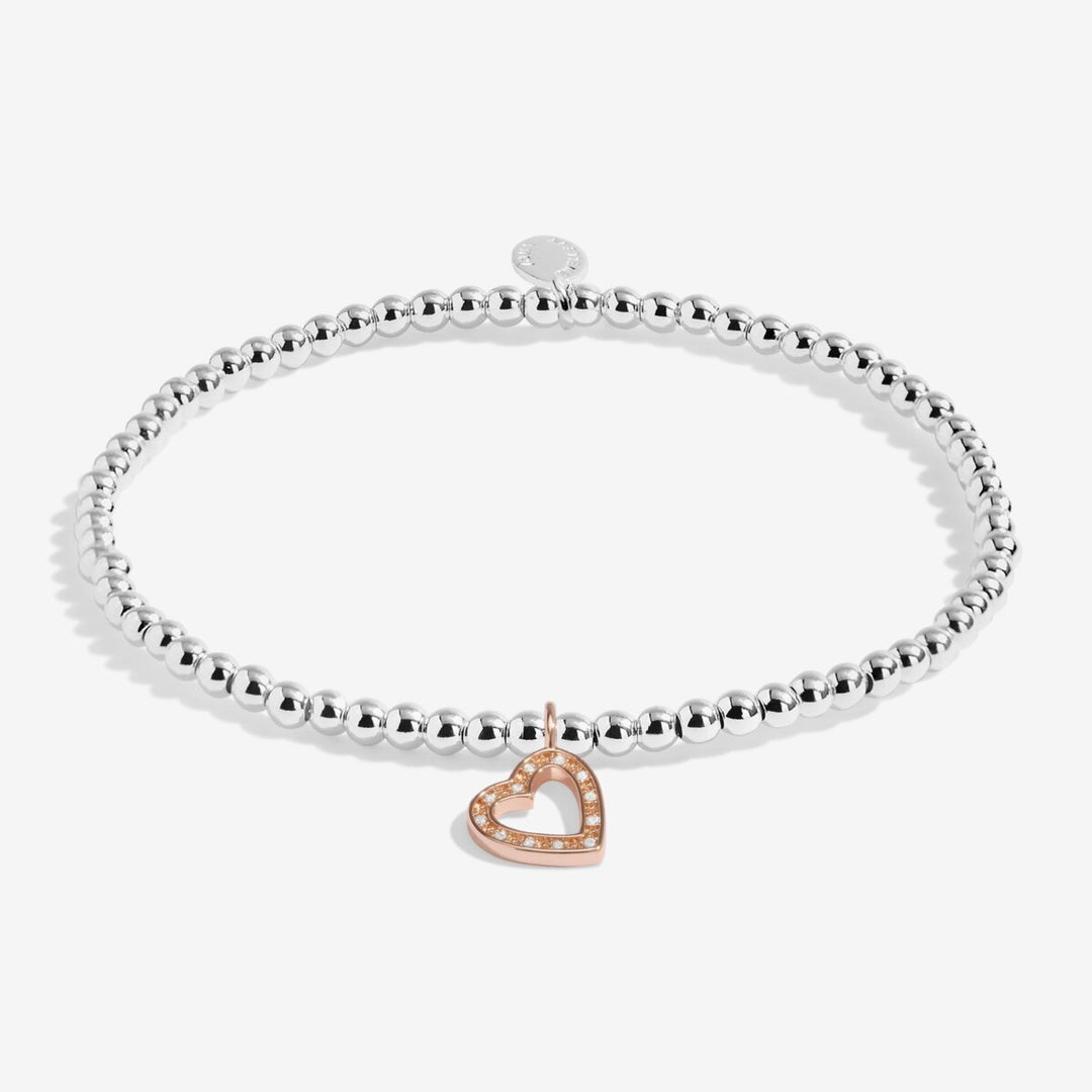 Silver and rose gold beaded "Happy Birthday" bracelet.