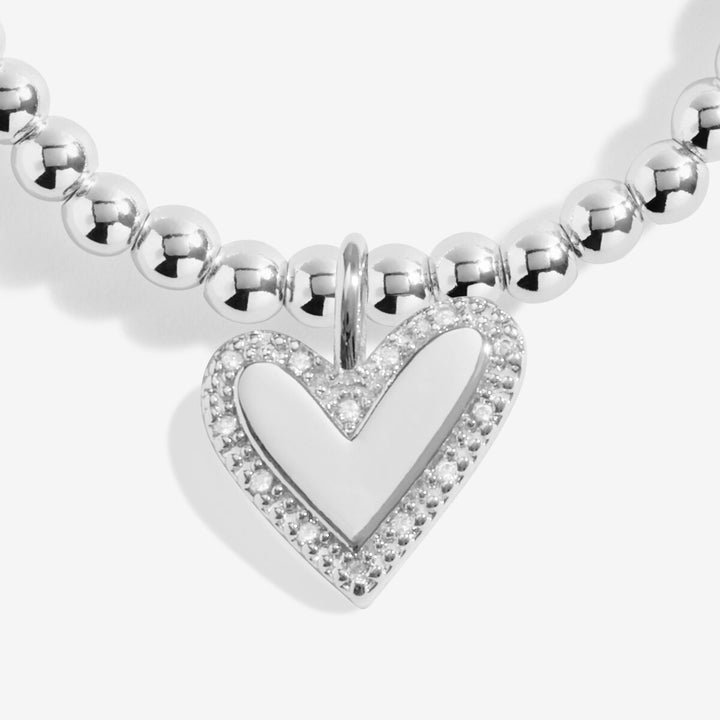 Silver and gold beaded stretch bracelet.