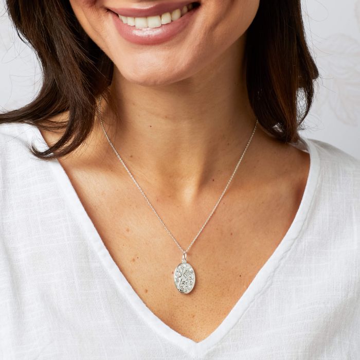 Laura Ashley mother of pearl floral necklace.