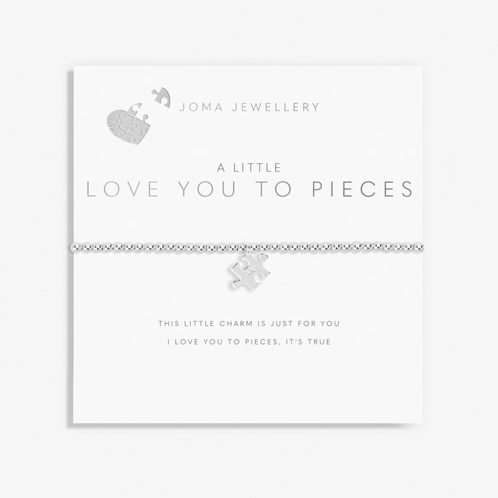 Joma Jewellery bracelet with puzzle piece charm on a white background