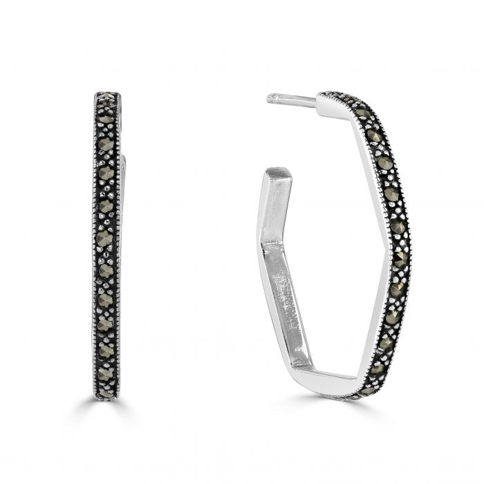 These are sterling silver hoop earrings with a hexagonal shape and marcasite stones, measuring 26mm wide.