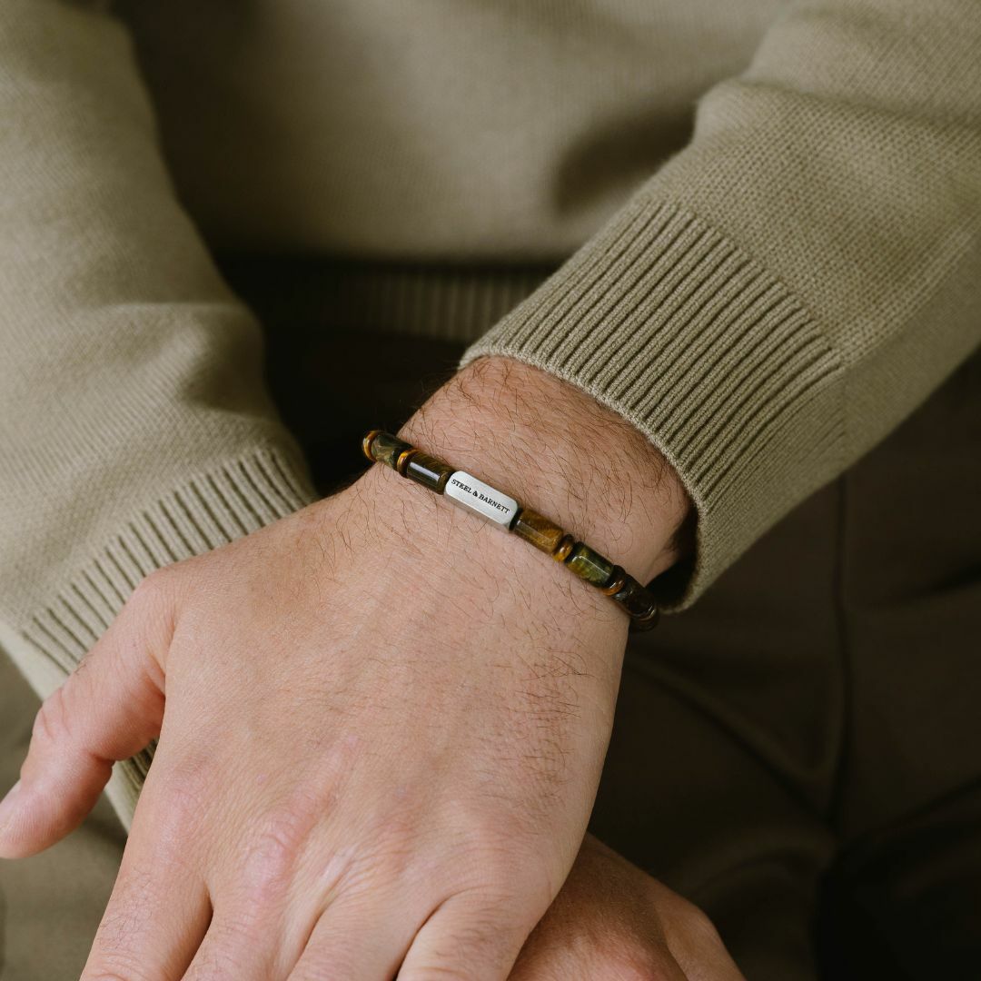 Tiger's eye beaded bracelet with a silver clasp.