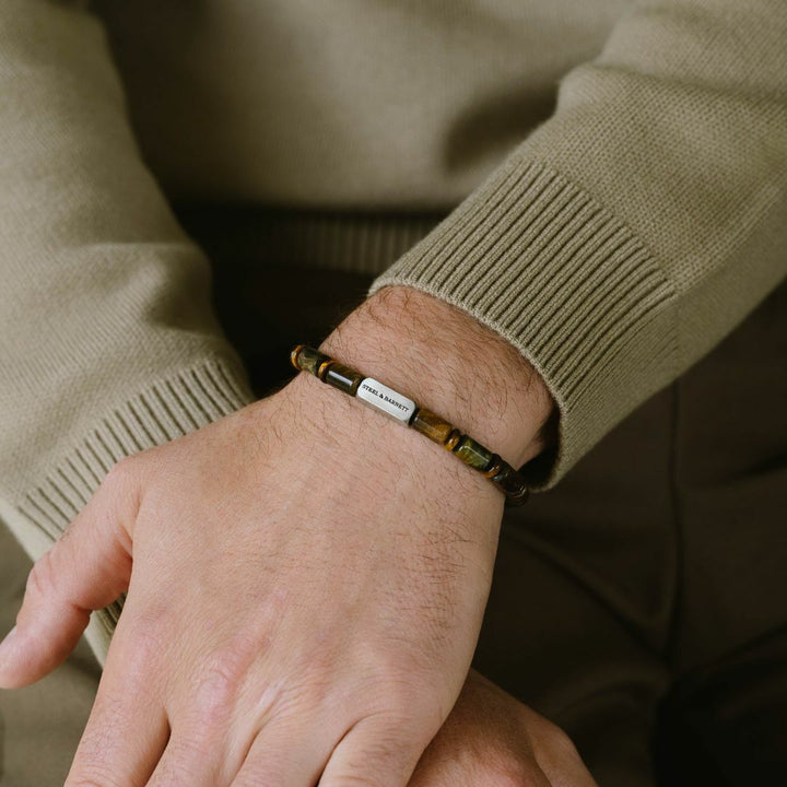 Tiger's eye beaded bracelet with a silver clasp.