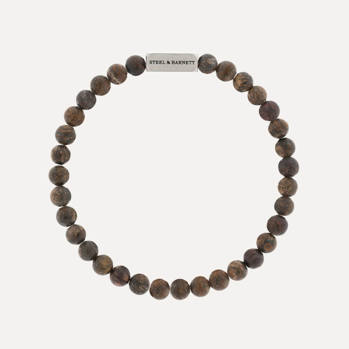 Bronzite Ned bracelet with blue sodalite beads and a silver clasp.