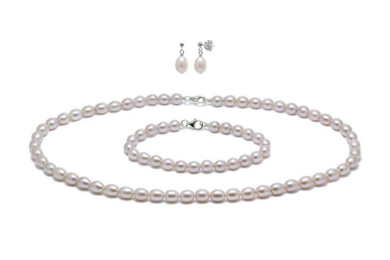 set of bracelet, earrings and necklace in pink barrel shaped pearls - Carathea