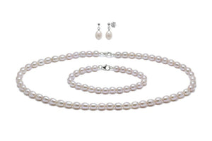 set of bracelet, earrings and necklace in pink barrel shaped pearls - Carathea