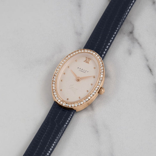 Ladies Radley watch with blue leather strap and champagne dial set with crystals - Carathea.