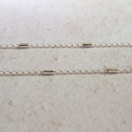 silver cylinder and rolo station chain necklace | Carathea