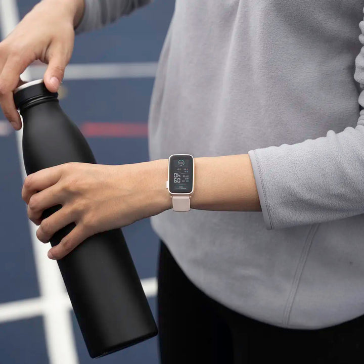 Sekonda smartwatch with a pink case and grey strap.