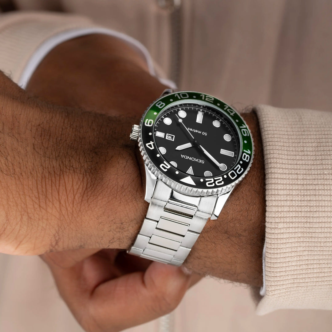 Sekonda Ocean Watch with a silver case, black and green bezel, and stainless steel bracelet.