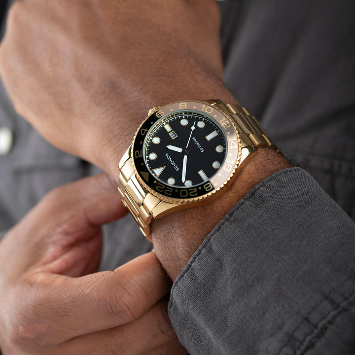 Sekonda gold and black watch with date display.
