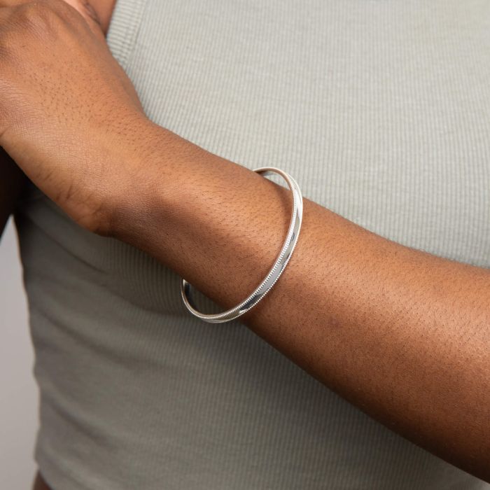 silver Millegrain 5mm wide bangle - Carathea jewellers