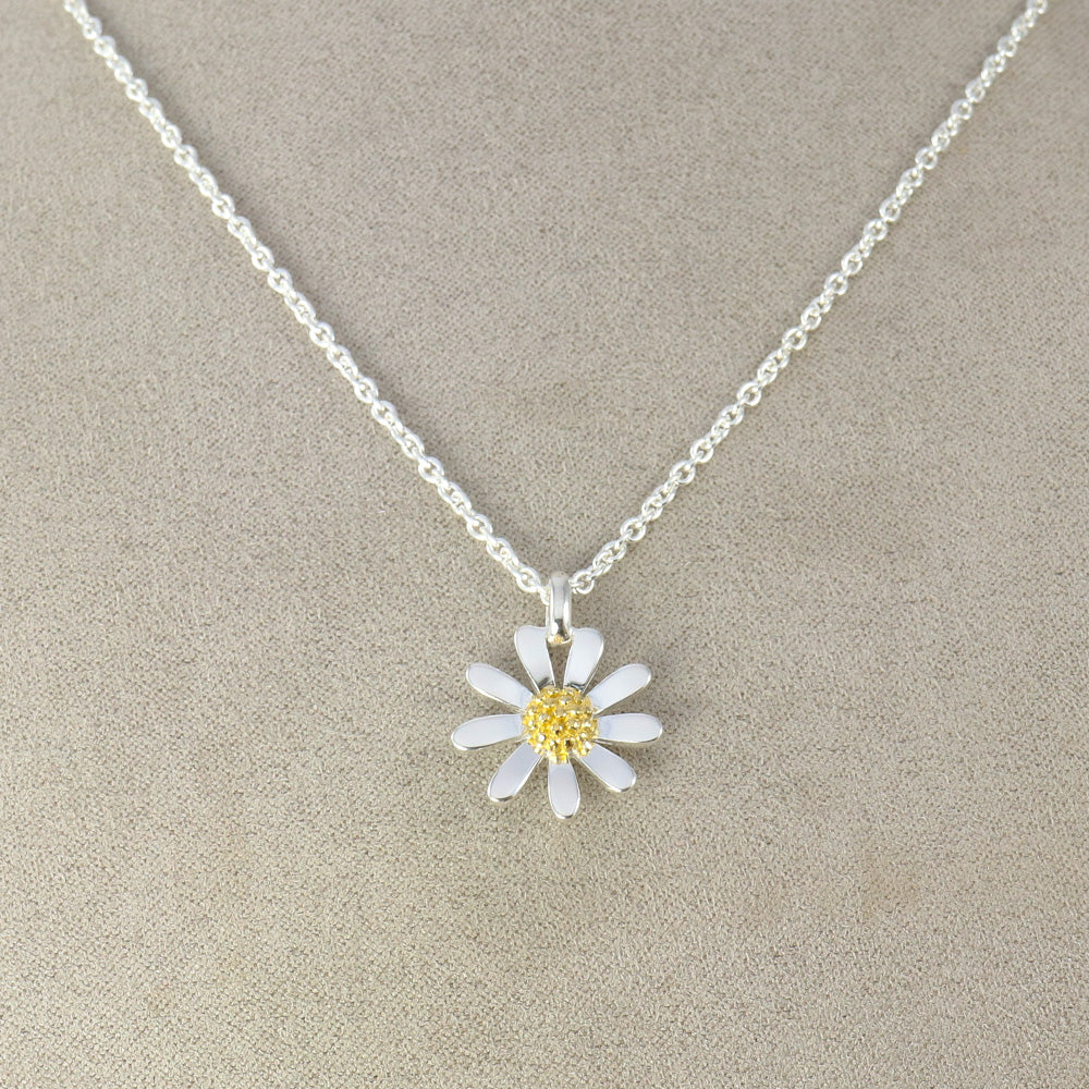 Sterling silver and gold daisy pendant necklace.