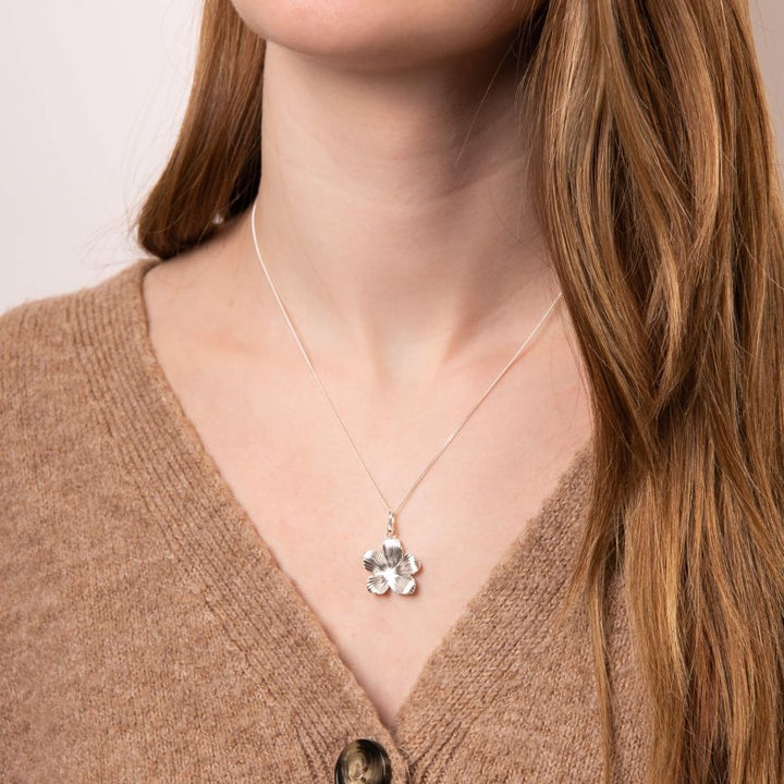 silver floral sunray pendant with chain | Carathea jewellers
