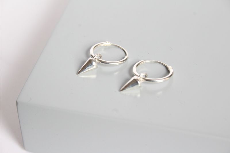 silver small hoop earrings with cone charm dangle | Carathea