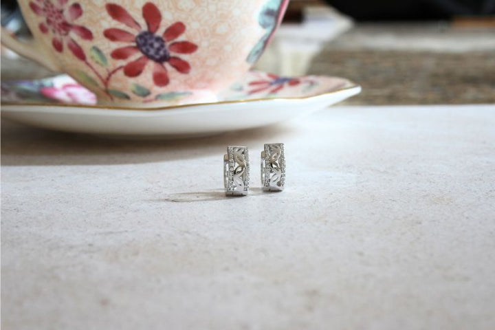 silver openwork huggie earrings with CZ edges - Carathea jewellers