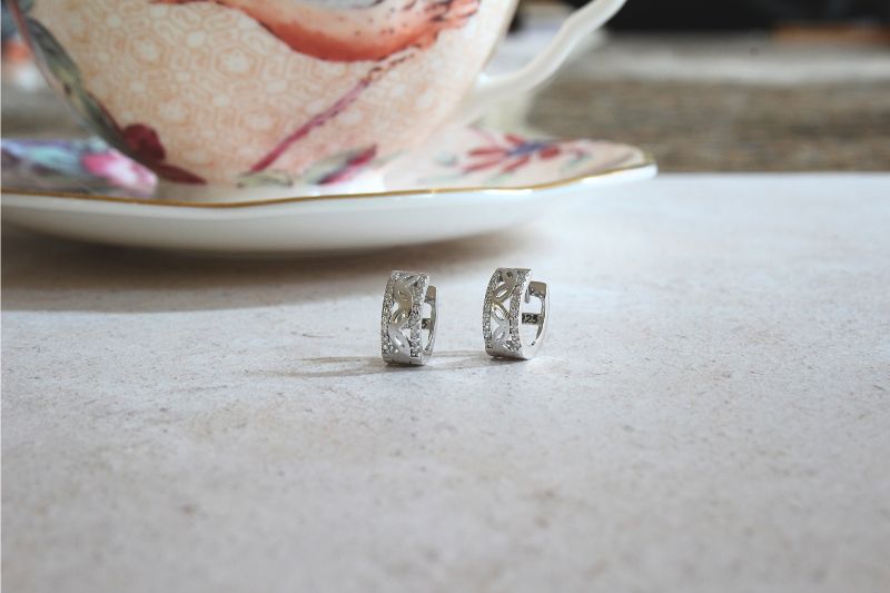 silver openwork huggie earrings with CZ edges - Carathea jewellers