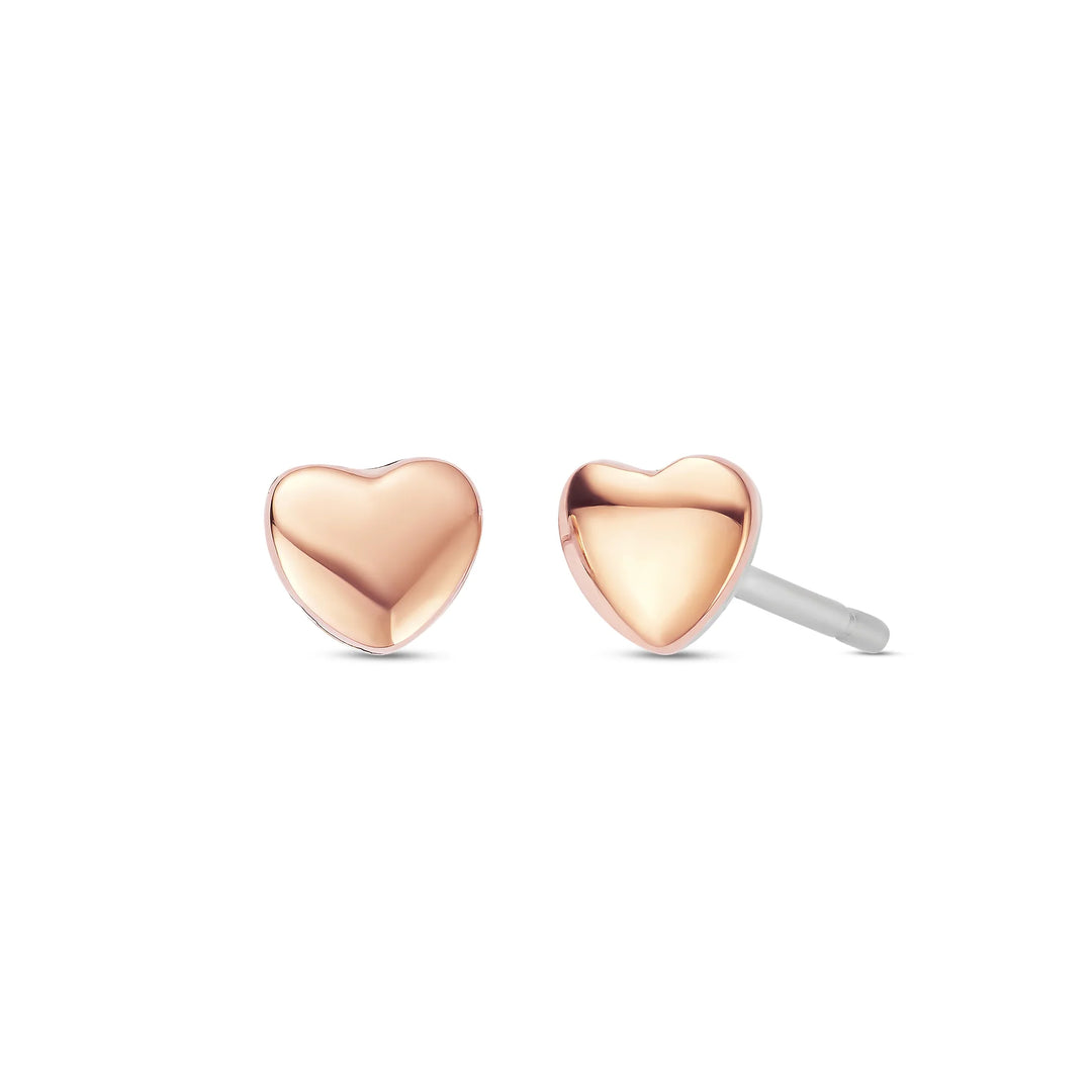 These are rose gold heart earrings made of sterling silver with a touch of rare Welsh gold.
