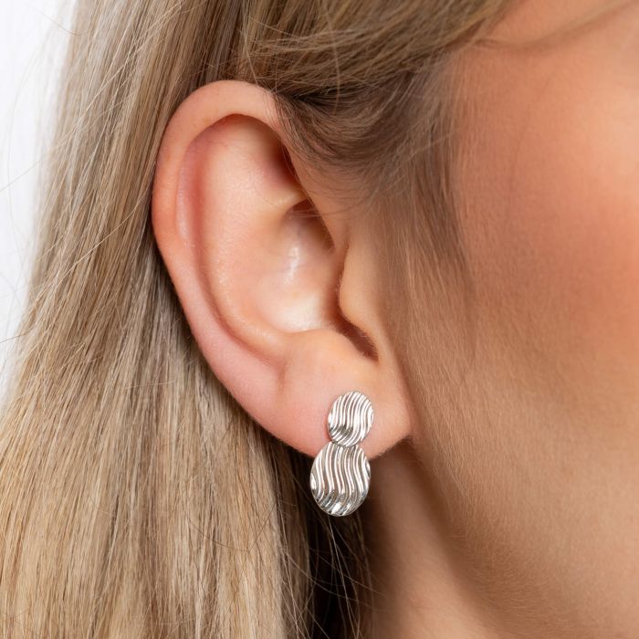 Sterling silver wavy drop earrings.