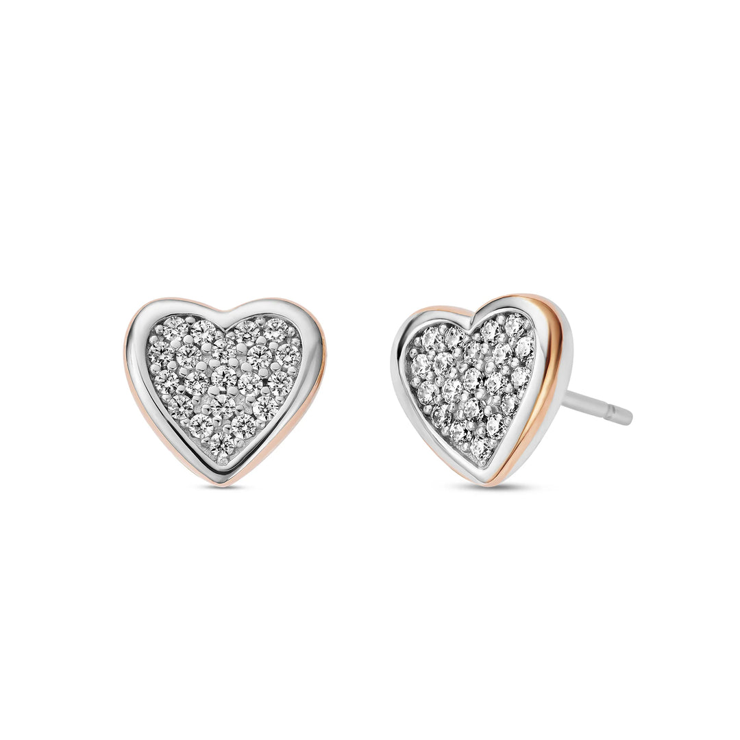 These are sterling silver, heart-shaped stud earrings with Swarovski Zirconia crystals and a touch of Welsh gold.