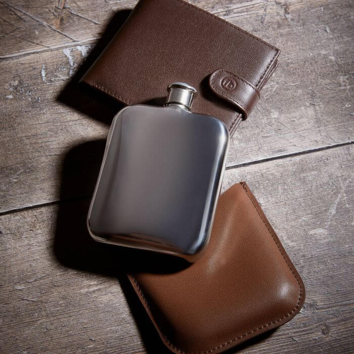 stainless steel hip flask with brown leather sleeve -Carathea jewellers