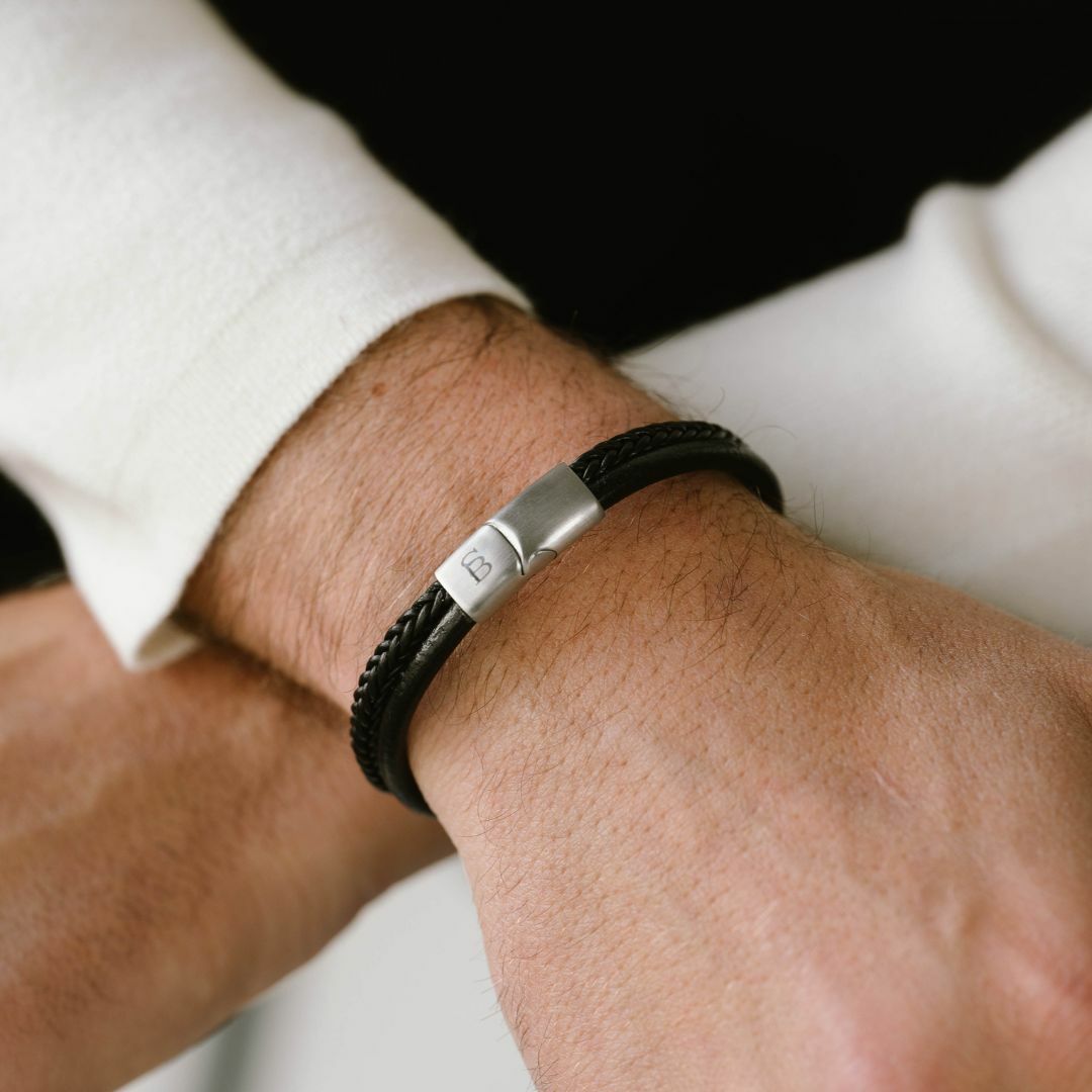 Black leather bracelet with a magnetic clasp.