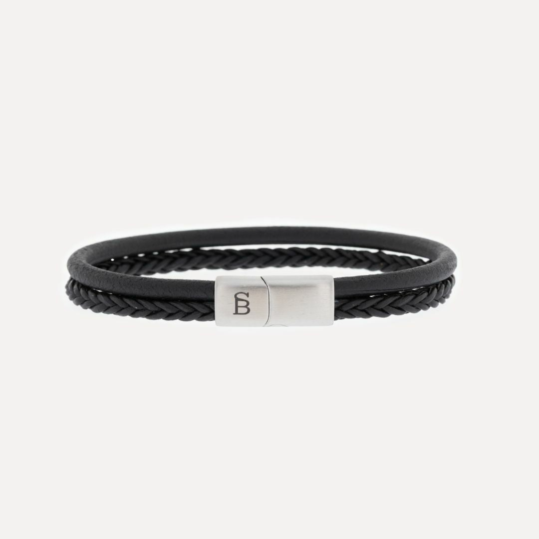 Black leather bracelet with a magnetic clasp.