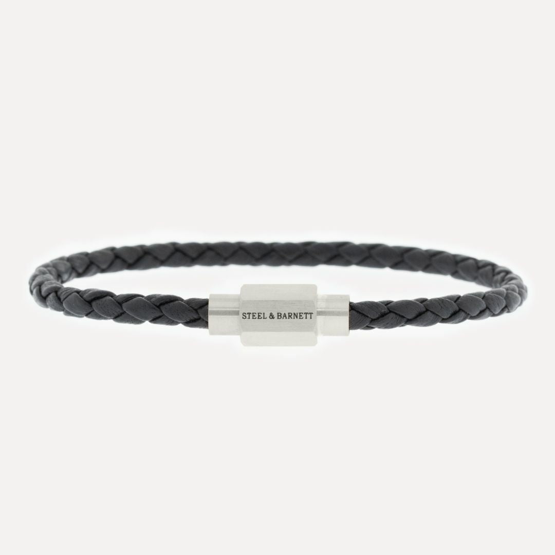Black leather bracelet with a silver magnetic clasp.