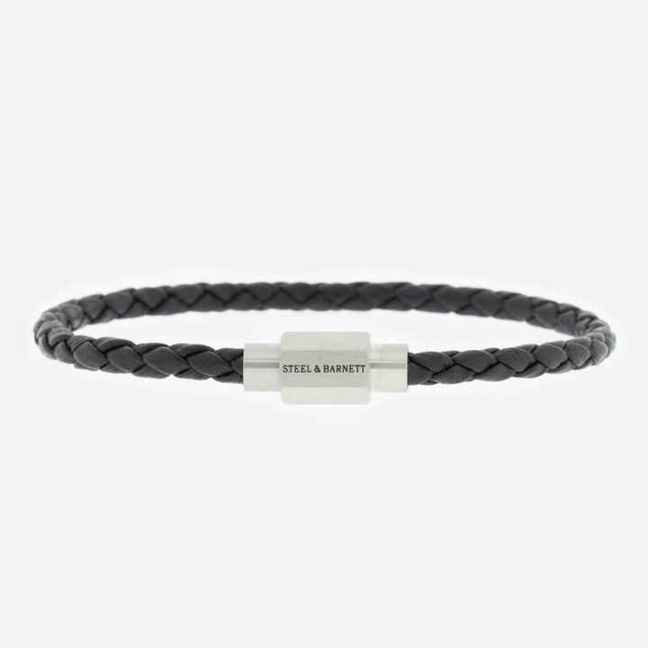 Black leather bracelet with a silver magnetic clasp.
