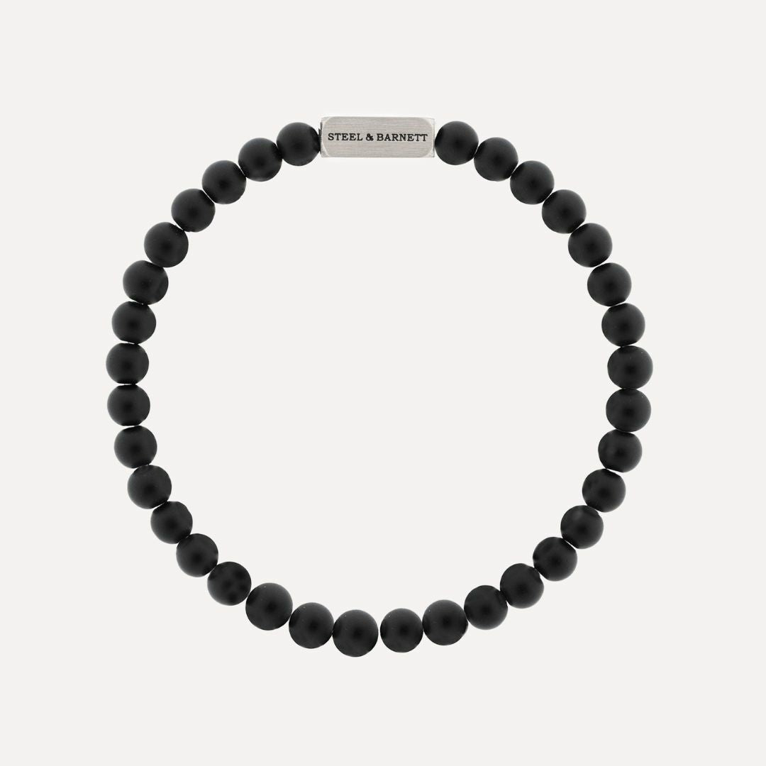 Mens matte black sodalite bead bracelet with silver clasp.