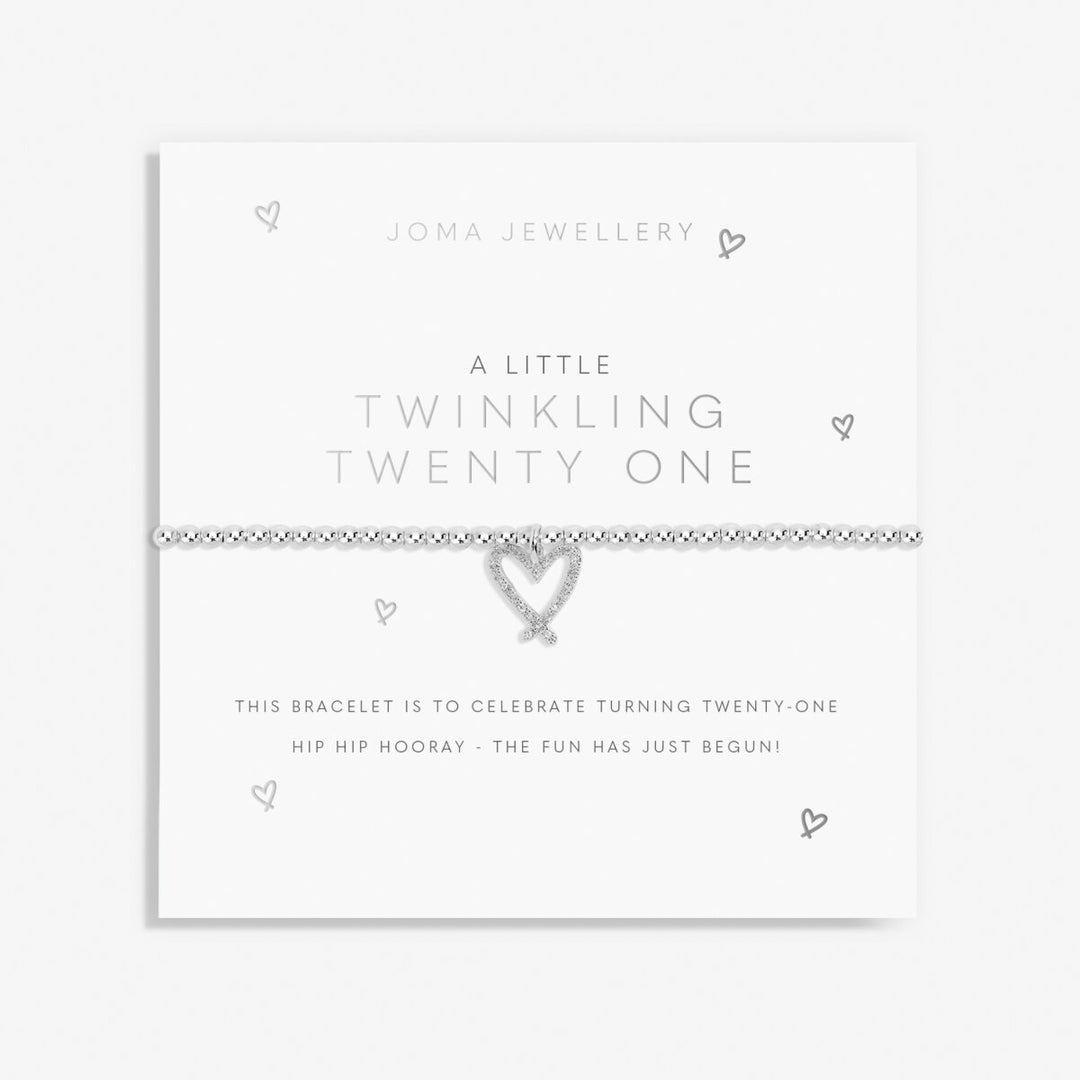 A silver bracelet with a heart-shaped link design, presented on a white card that reads 'JOMA JEWELLERY' and 'A LITTLE TWINKLING TWENTY ONE'.