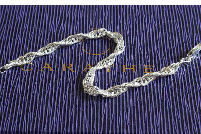 silver twisted oval link bracelet | Carathea
