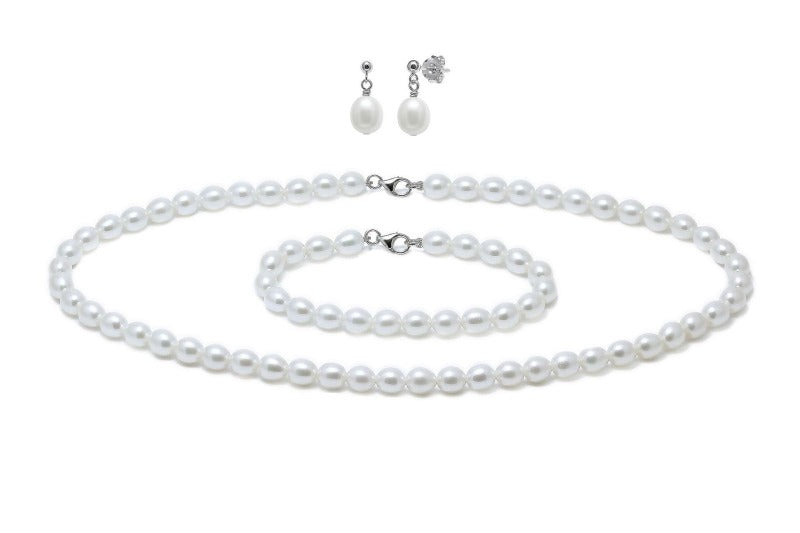 set of bracelet, earrings and necklace in white barrel shaped pearls - Carathea