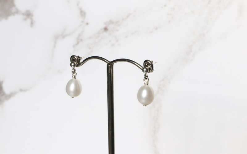 silver drop earrings with white barrel shape pearl earrings - Carathea jewellers
