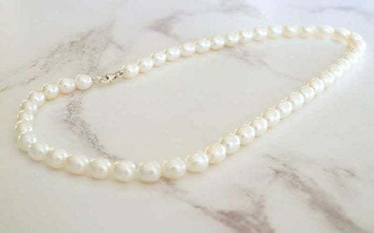 silver and barrel shaped white pearl necklace - Carathea jewellers