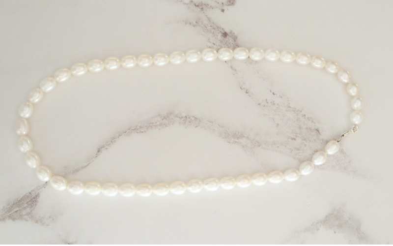silver and barrel shaped white pearl necklace - Carathea jewellers