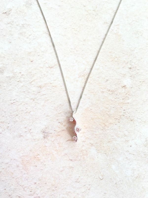 9ct white gold squiggle pendant with 3 diamonds Carathea jewellers
