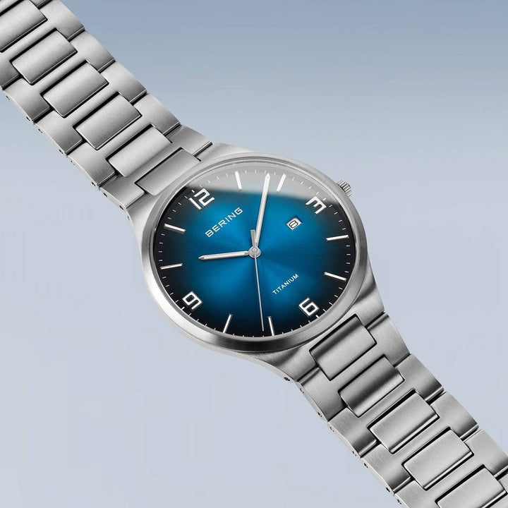 Bering Men's Titanium Watch with Blue Dial 15240-777 Watches Bering