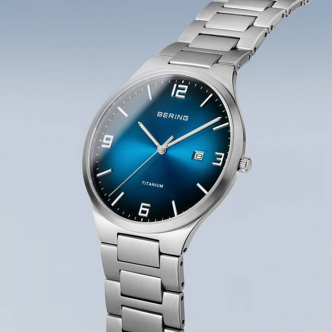 Bering Men's Titanium Watch with Blue Dial 15240-777 Watches Bering