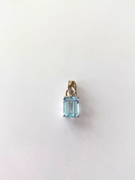 White and Yellow Gold Pendant with Baguette Cut Blue Topaz