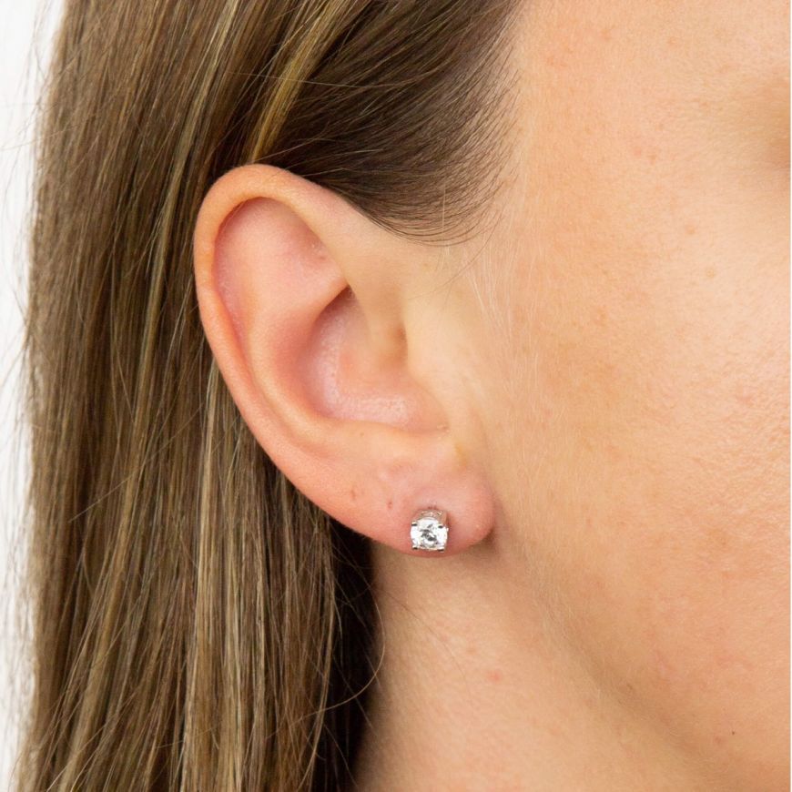 Diamonfire 0.5 carat solitaire CZ stud earrings on model Jewellery Carathea