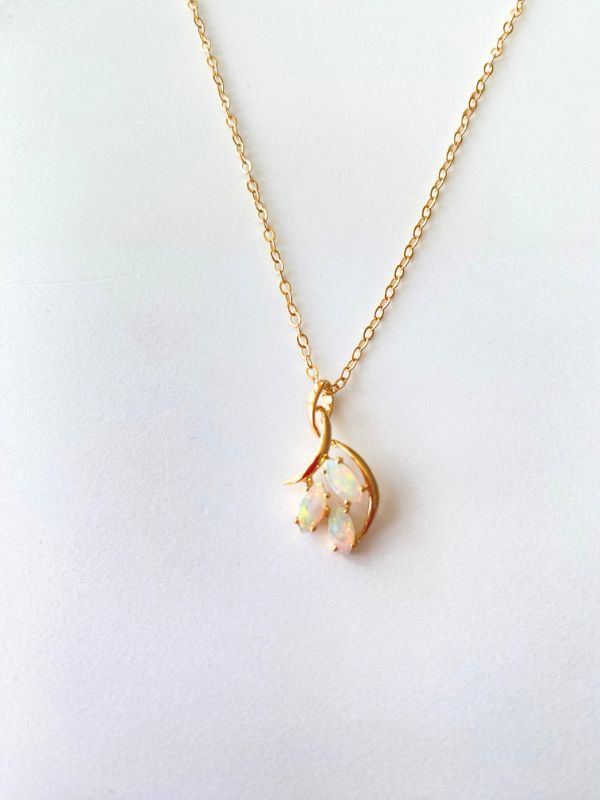 Gold Pendant with Three Opals