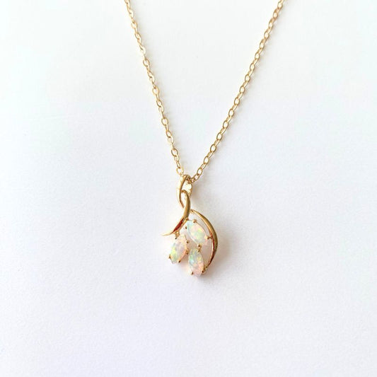 Gold Pendant with Three Opals